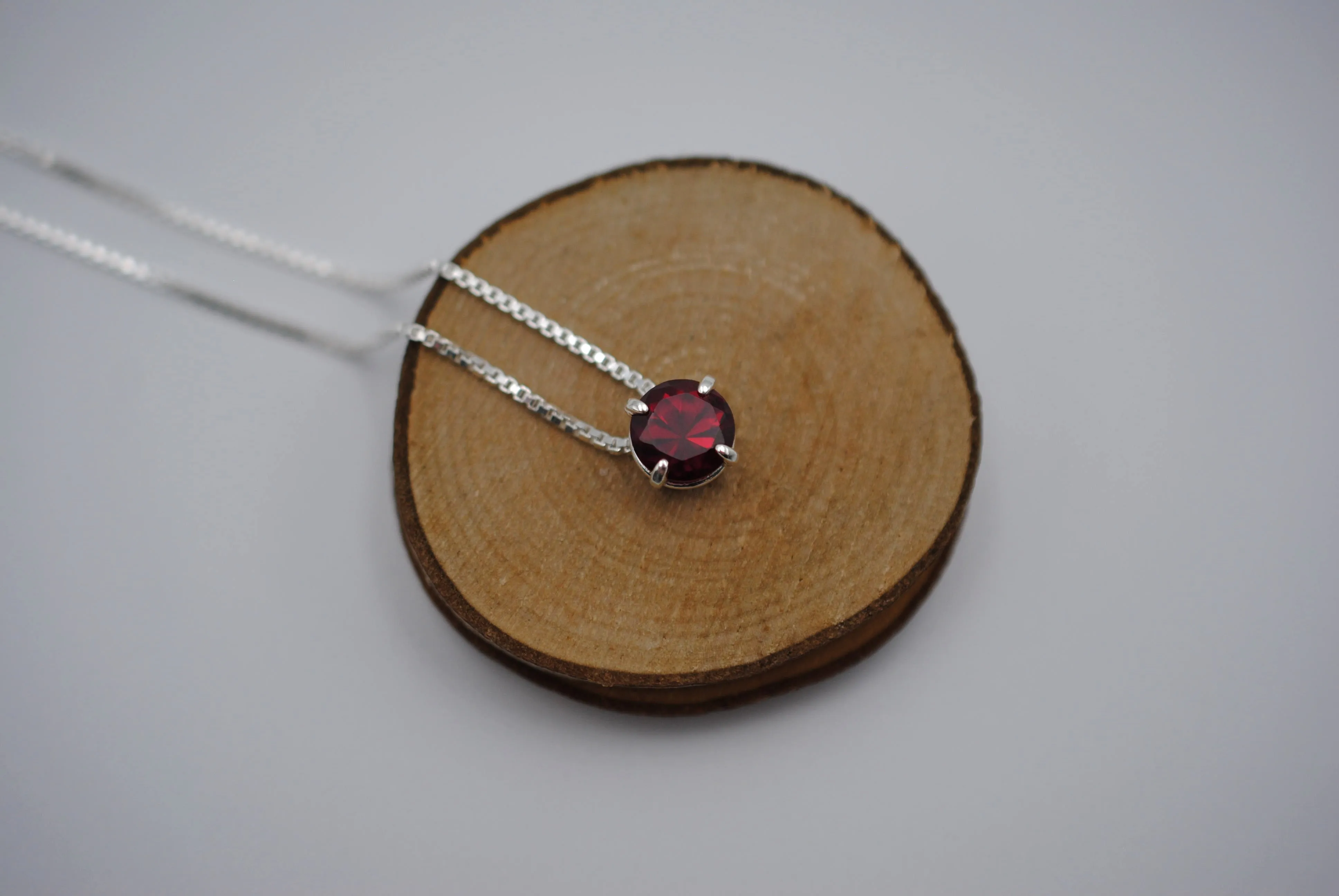 Birthstone Necklace: Round Garnet, Silver Prong Setting, Adjustable Chain