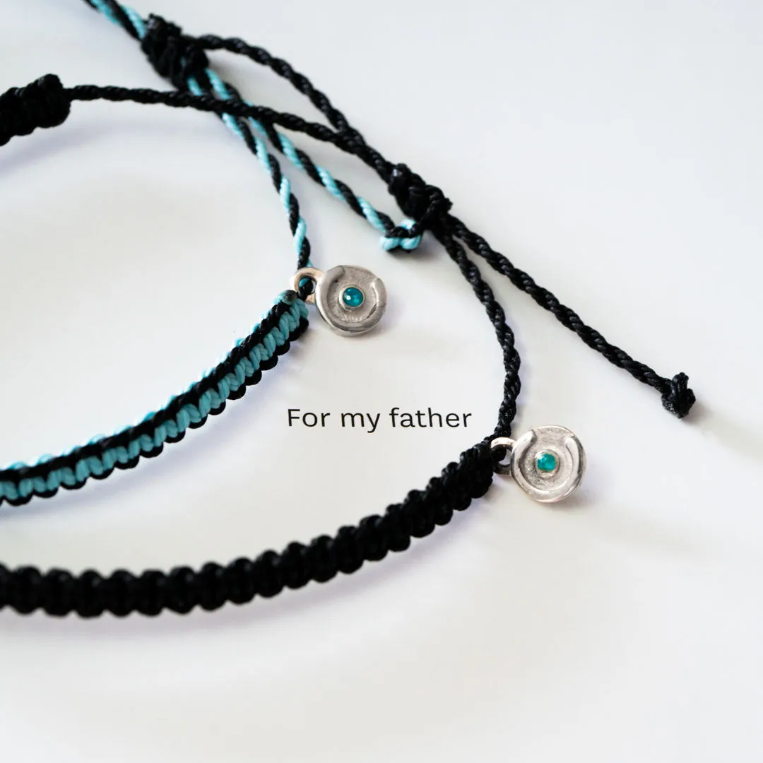 Bold Black Cobra bracelet with 925S Silver & Blue Topaz Power Pose charm