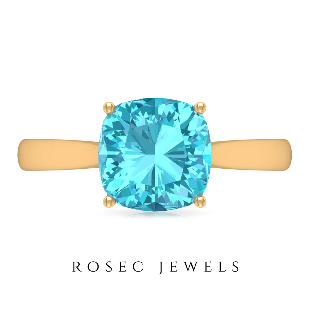 Cushion Cut Swiss Blue Topaz Solitaire Engagement Ring with Surprise Diamond