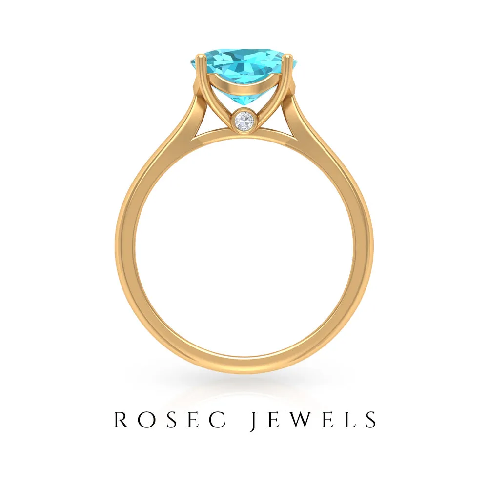 Cushion Cut Swiss Blue Topaz Solitaire Engagement Ring with Surprise Diamond